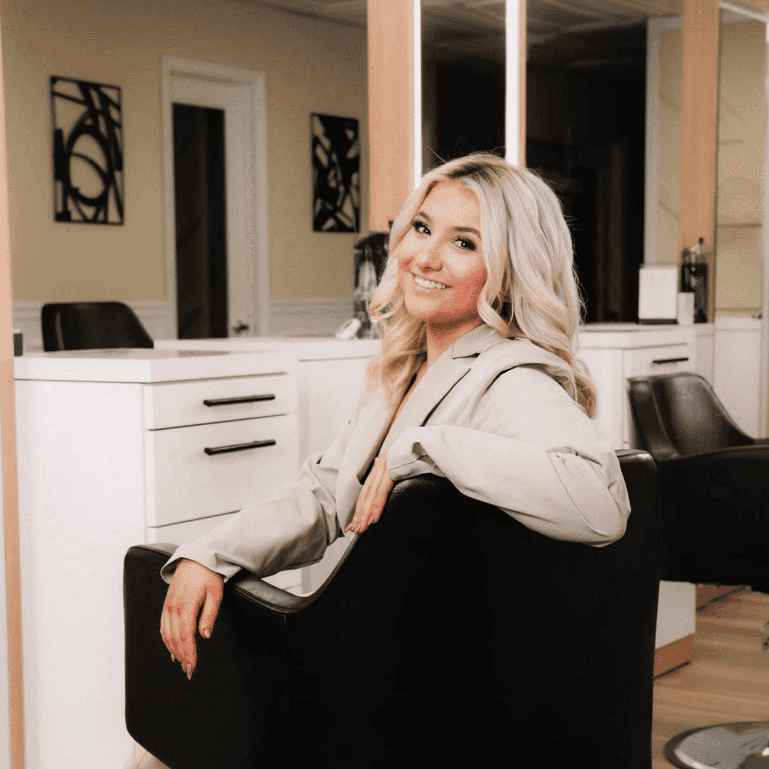 Portrait of Christina, a professional stylist at The Beauty Vault Hair Salon, showcasing their expertise and style.