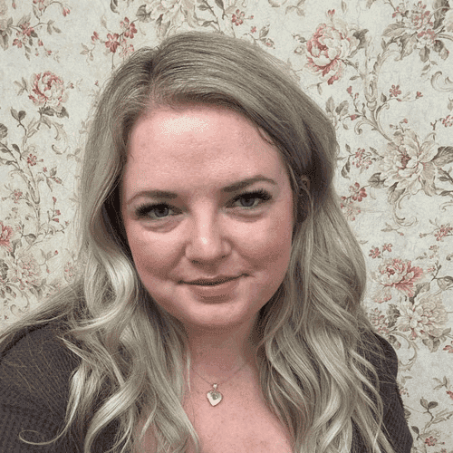 Portrait of Jenny, a professional stylist at The Beauty Vault Hair Salon, showcasing their expertise and style.